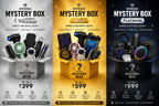 Three promotional panels for Mykiso Mystery Box packages: Silver, Gold, and Platinum. Each panel shows an open mystery box filled with assorted gadgets and accessories, with the Mykiso branding and pricing text prominently displayed.